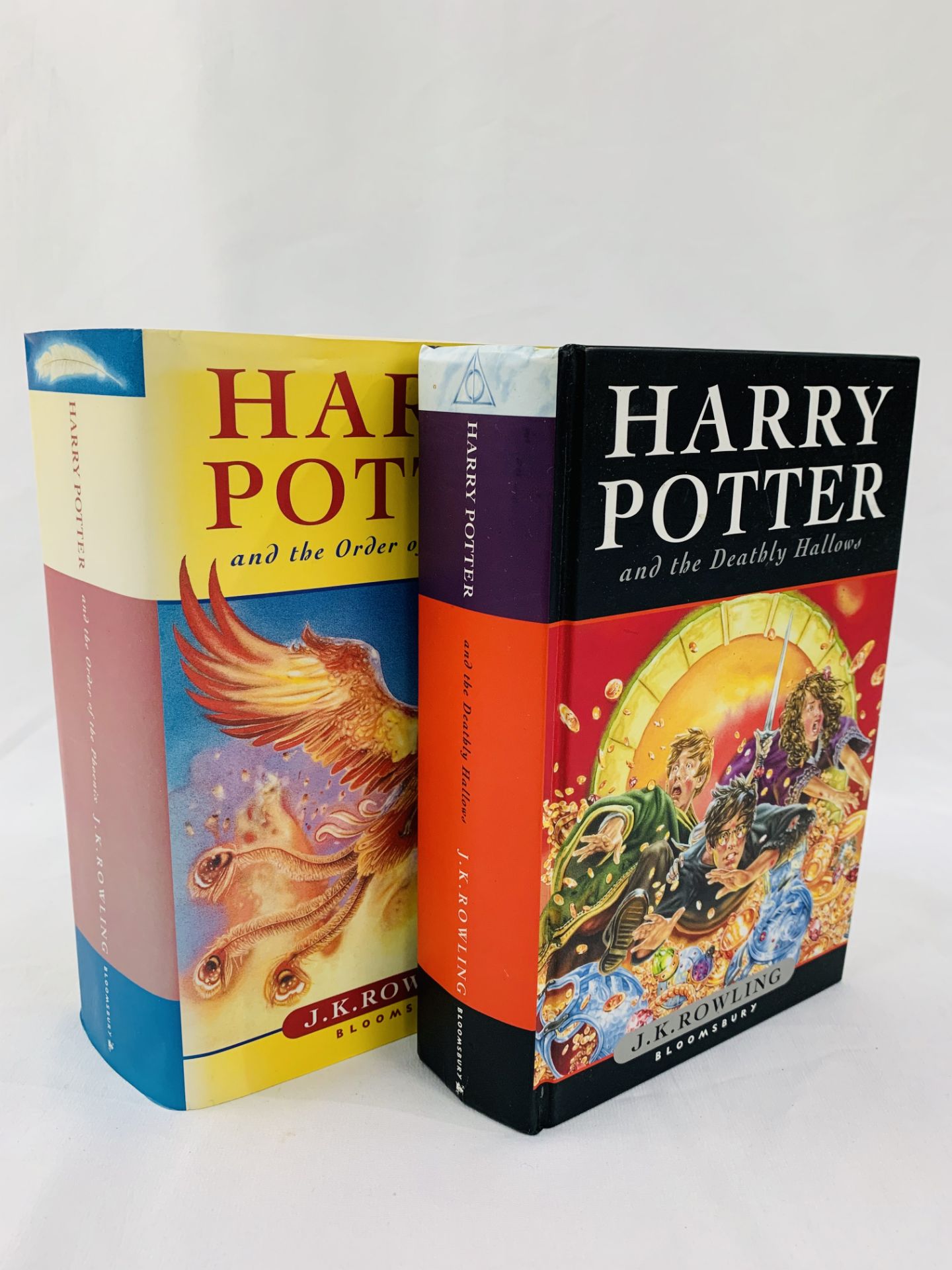 2 Harry Potter hard back first editions "The Order of the Phoenix" and "The Deathly Hallows".