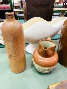 Large parian vase, two stoneware bottles, and stoneware jug.