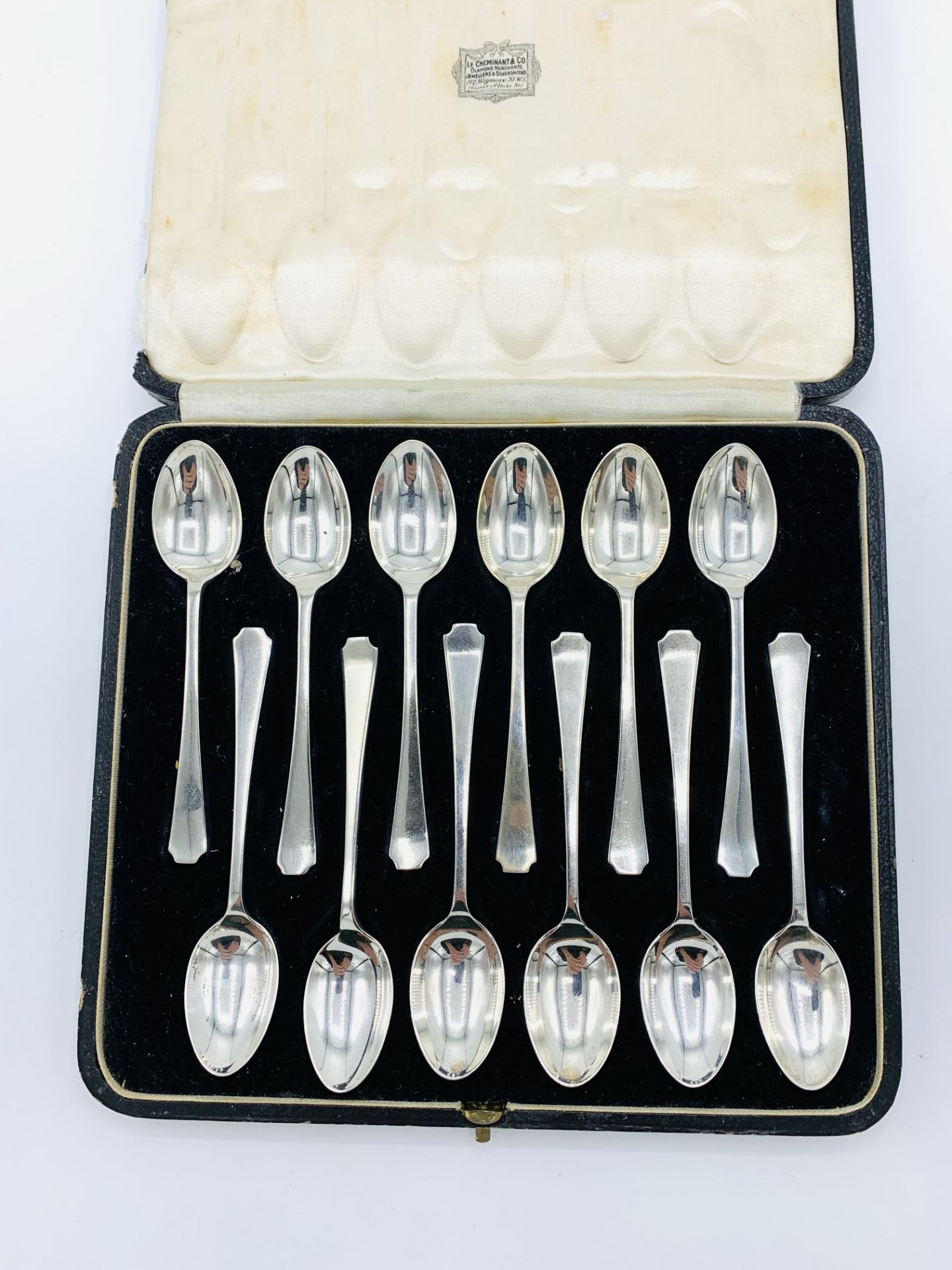 Set of 12 Art Deco silver teaspoons, hallmarked Sheffield 1936, in original case