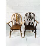 Two Windsor style open armchairs.