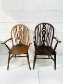 Two Windsor style open armchairs.