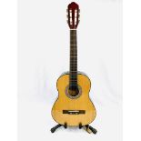 Child's classical guitar in a Jose Ferre carry case.