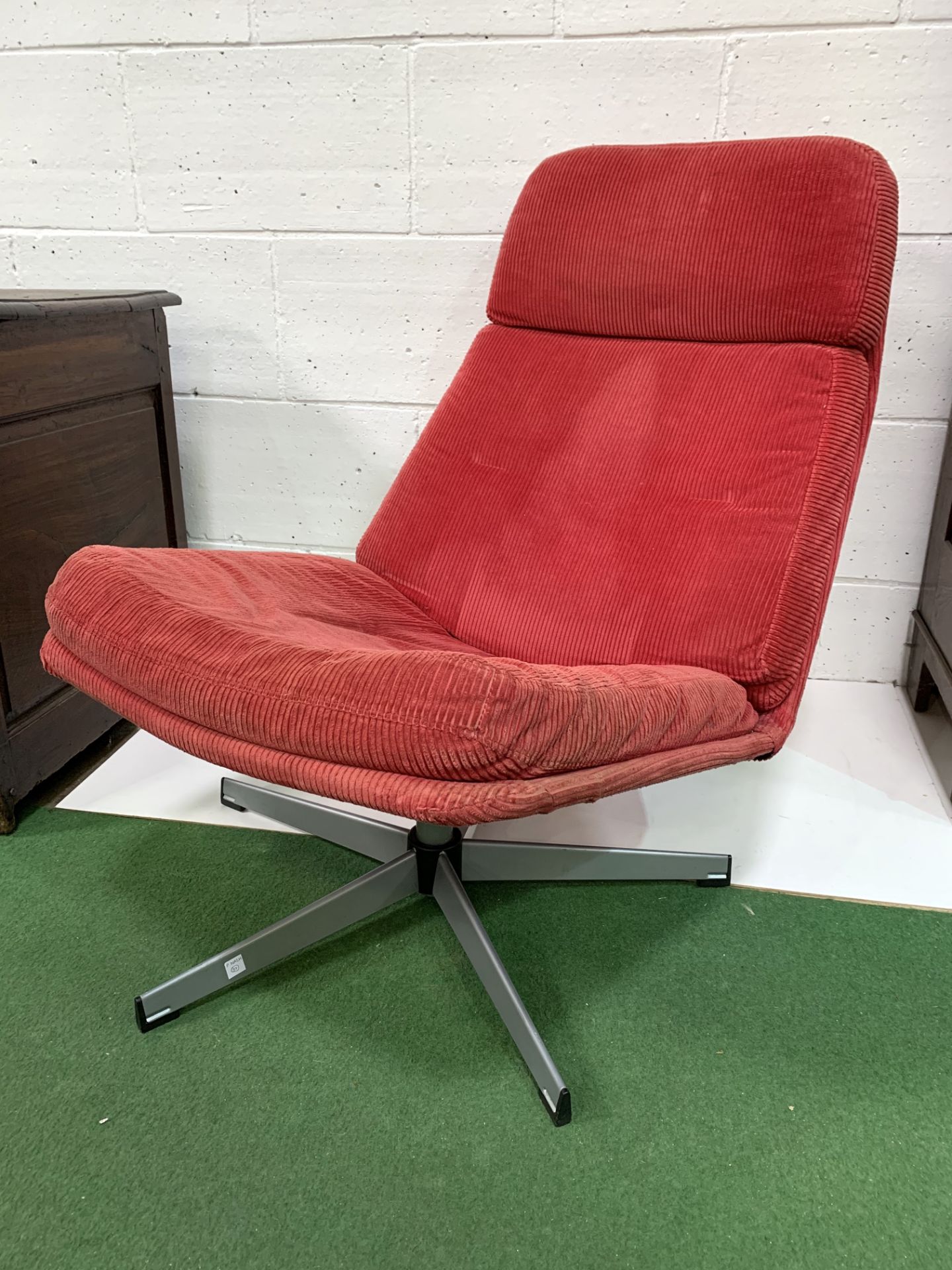 Low swivel lounge chair upholstered in red cord. - Image 2 of 2