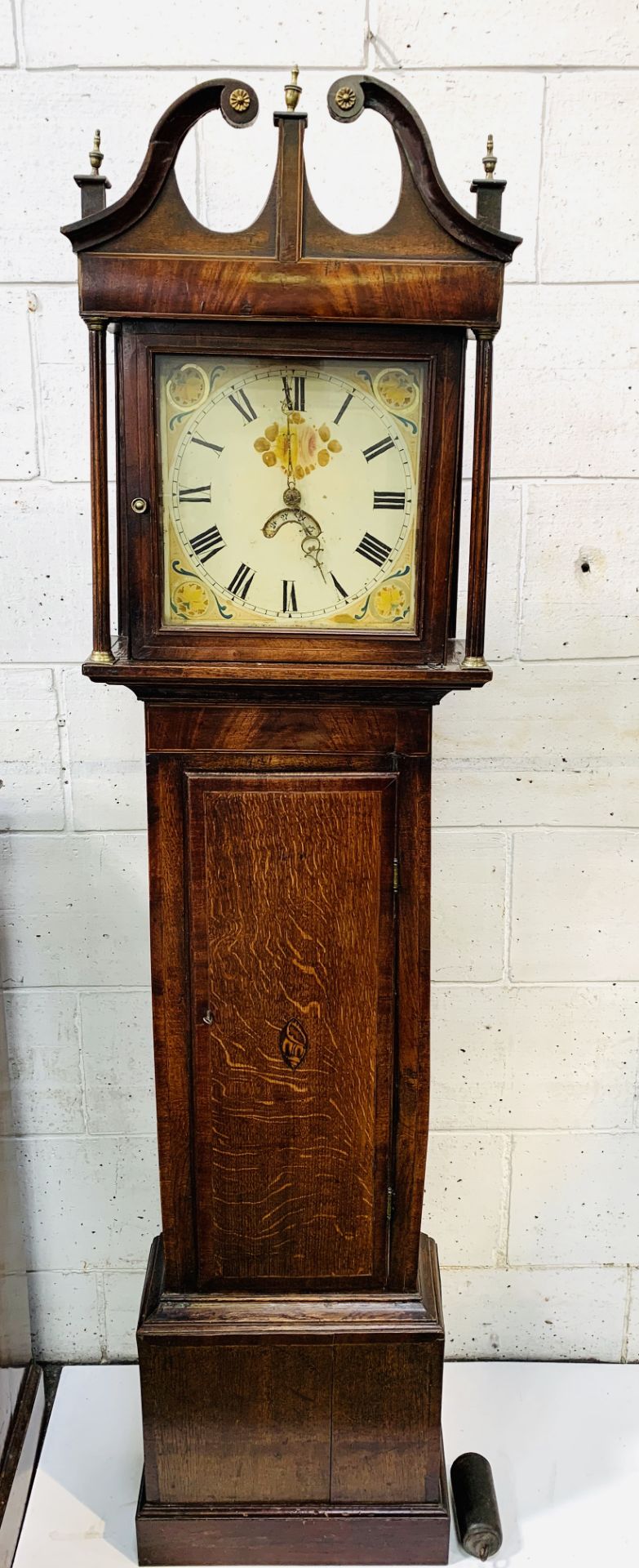 Oak and mahogany long case clock with painted face, date aperture, single weight.