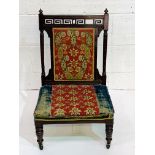 French Mahogany 19th Century nursing chair with original fabric.