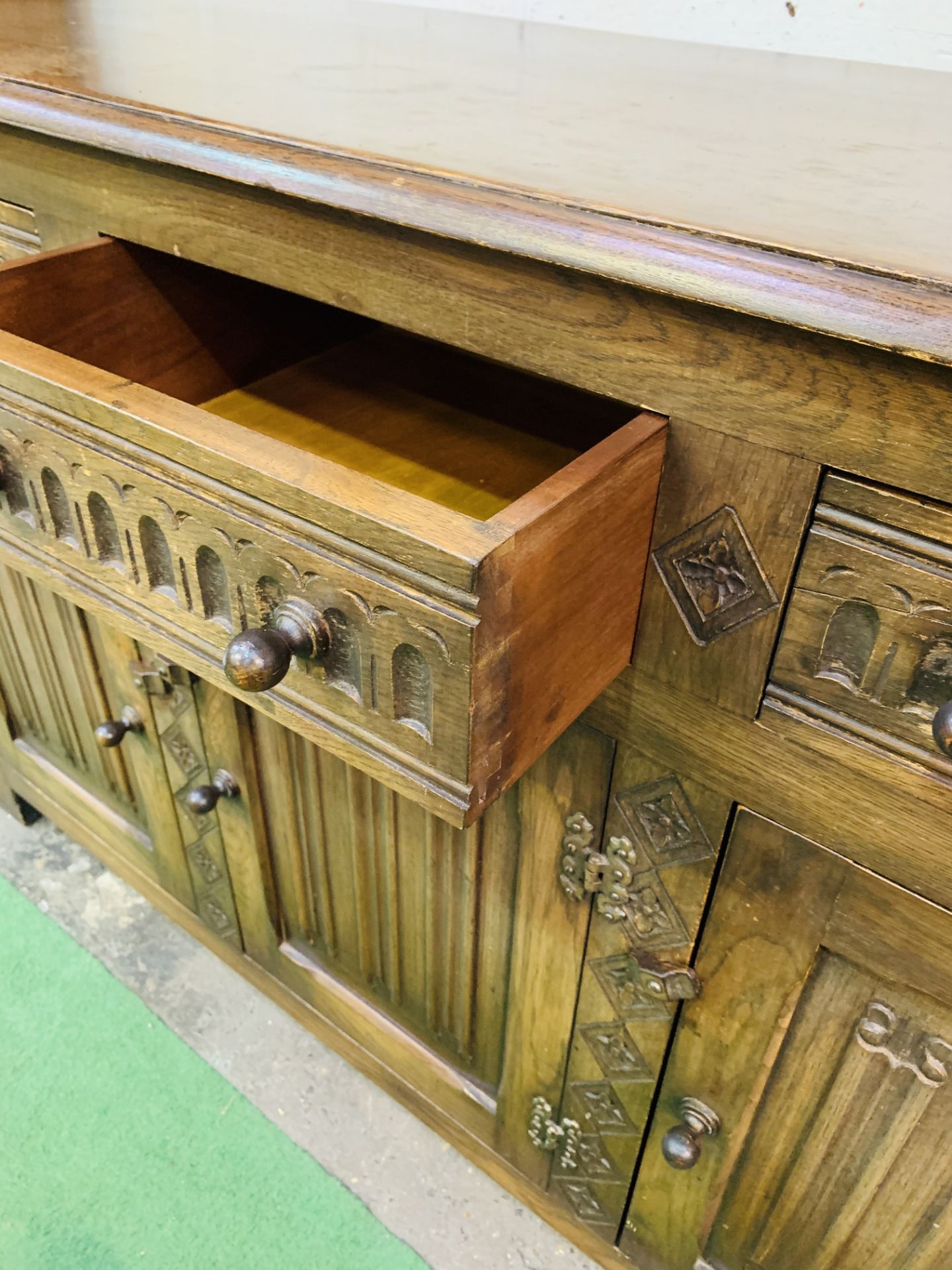 1930's oak sideboard with three frieze drawers over three cupboards. - Image 4 of 6