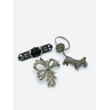 Four items of marcasite jewellery.
