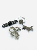 Four items of marcasite jewellery.