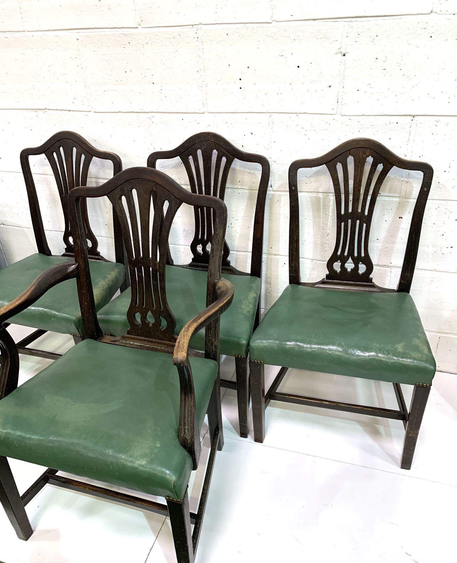 Set of four Victorian dining chairs, three plus one, upholstered in green leather. - Image 2 of 5