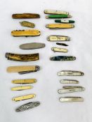 Collection of 22 pocket knives including four silver bladed fruit knives.