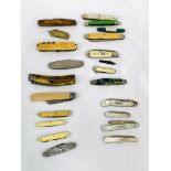 Collection of 22 pocket knives including four silver bladed fruit knives.
