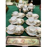 Japanese porcelain tea set; two Beswick figurines; and tin of antique dominoes.