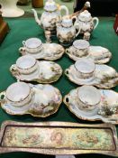 Japanese porcelain tea set; two Beswick figurines; and tin of antique dominoes.