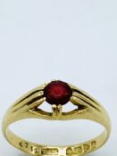 18ct gold and ruby ring, size T, weight 3.7gms.