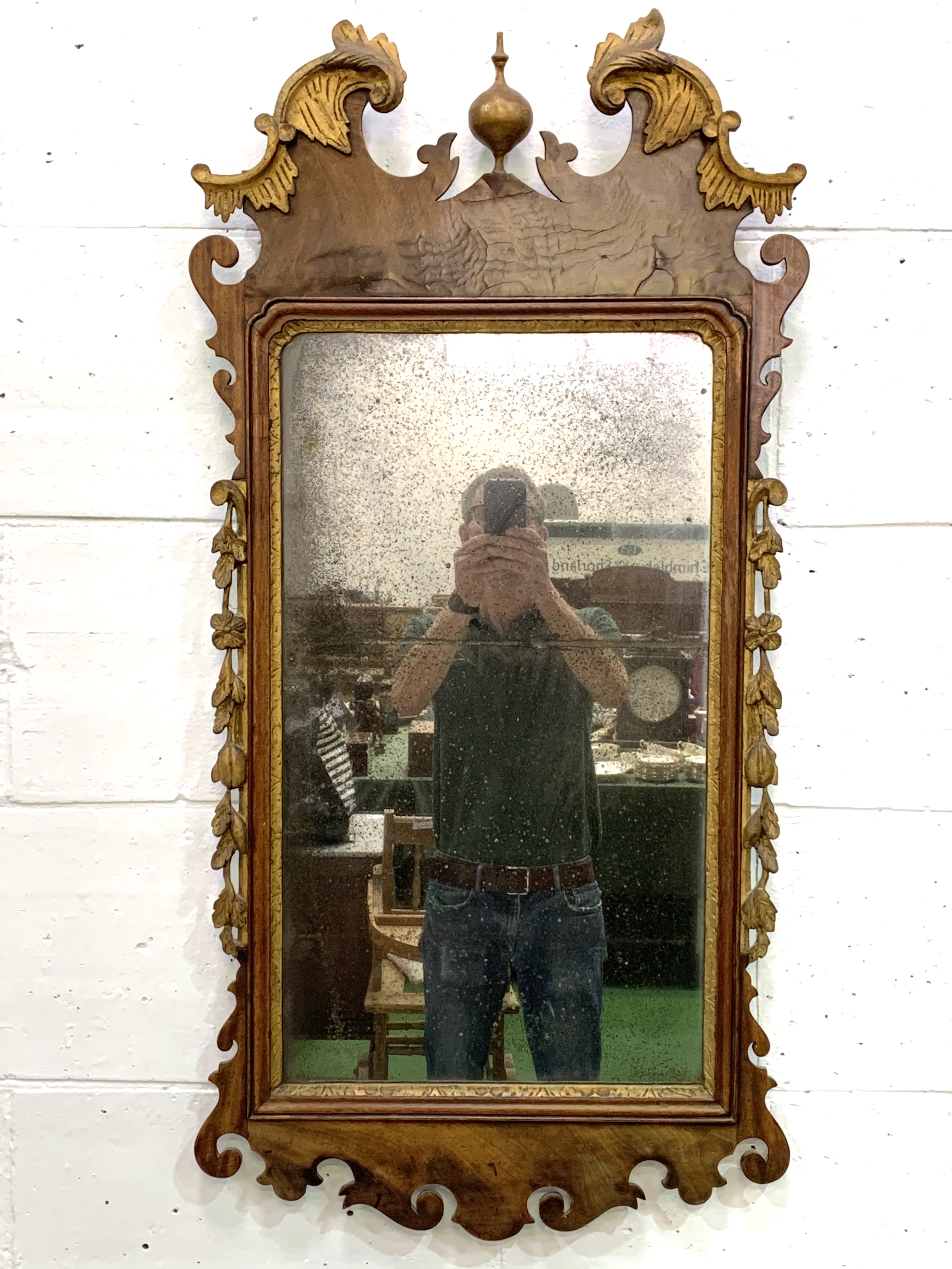 Chippendale walnut and carved gilt framed wall mirror.