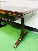 Oak draw leaf table on stretcher base.