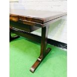 Oak draw leaf table on stretcher base.