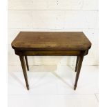 Mahogany gate leg side table with fold over top on tapered legs.