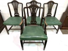 Set of four Victorian dining chairs, three plus one, upholstered in green leather.