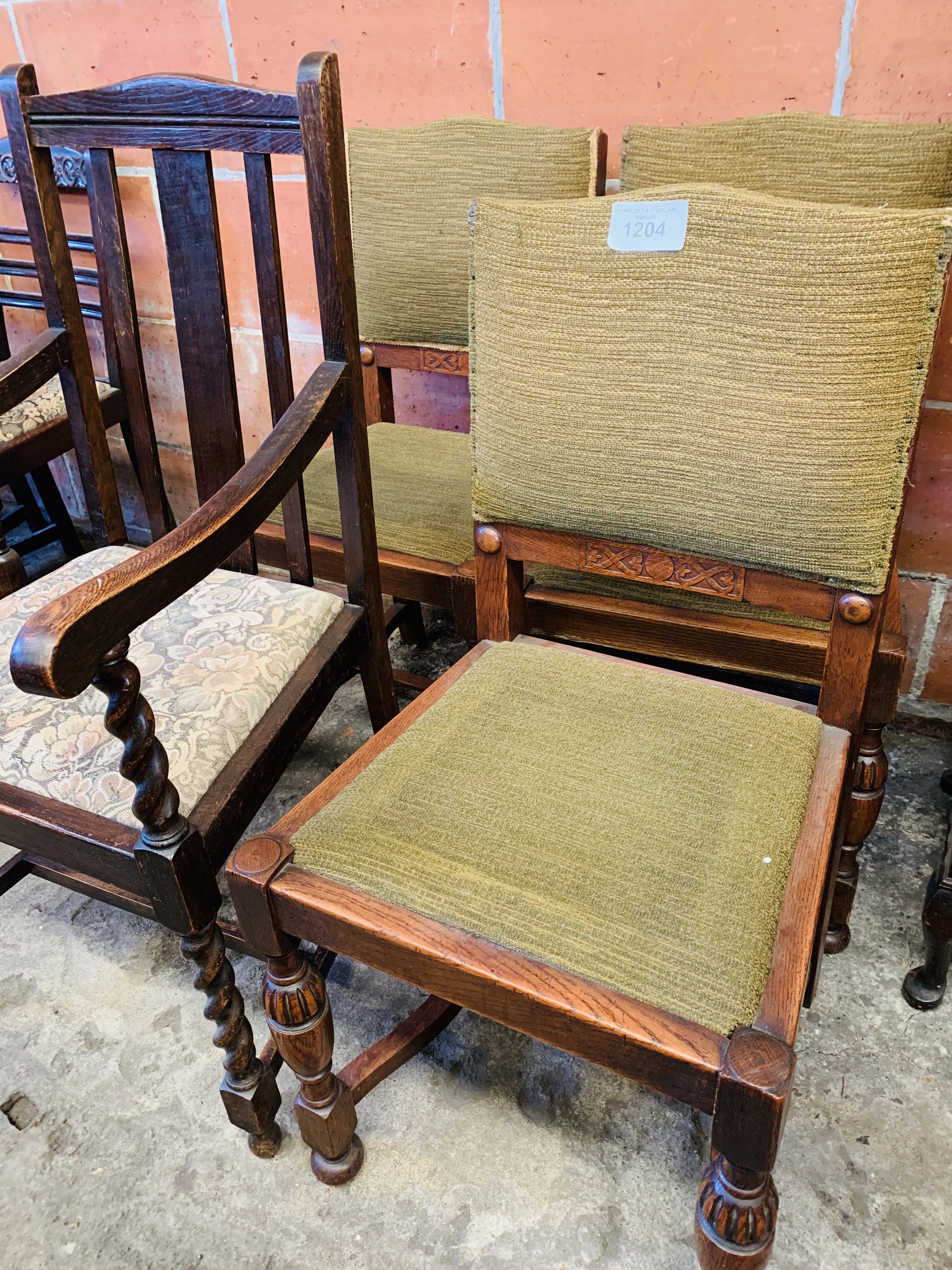 Oak framed open armchair and 3 oak framed dining chairs.