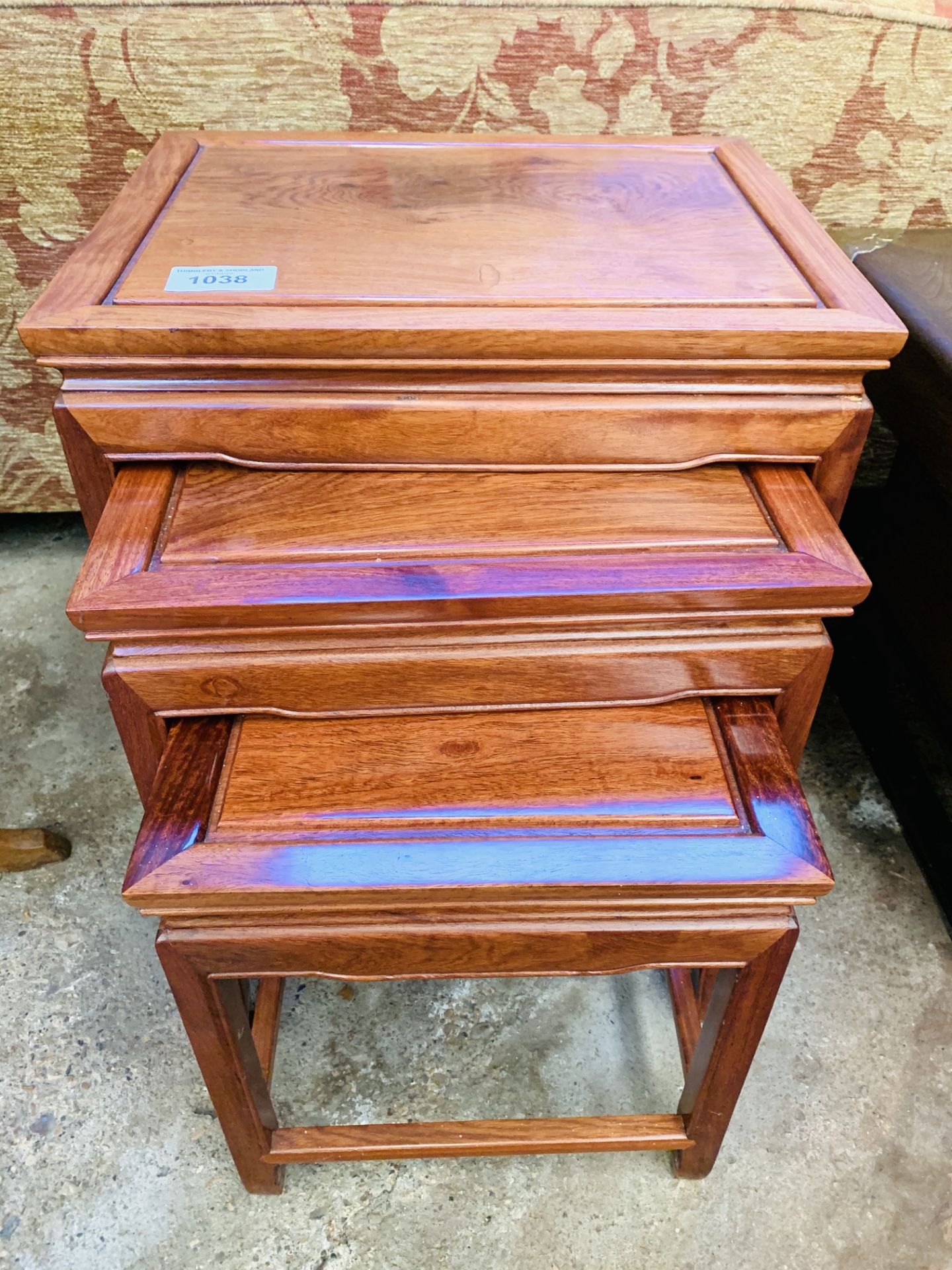 Nest of three oriental style tables.