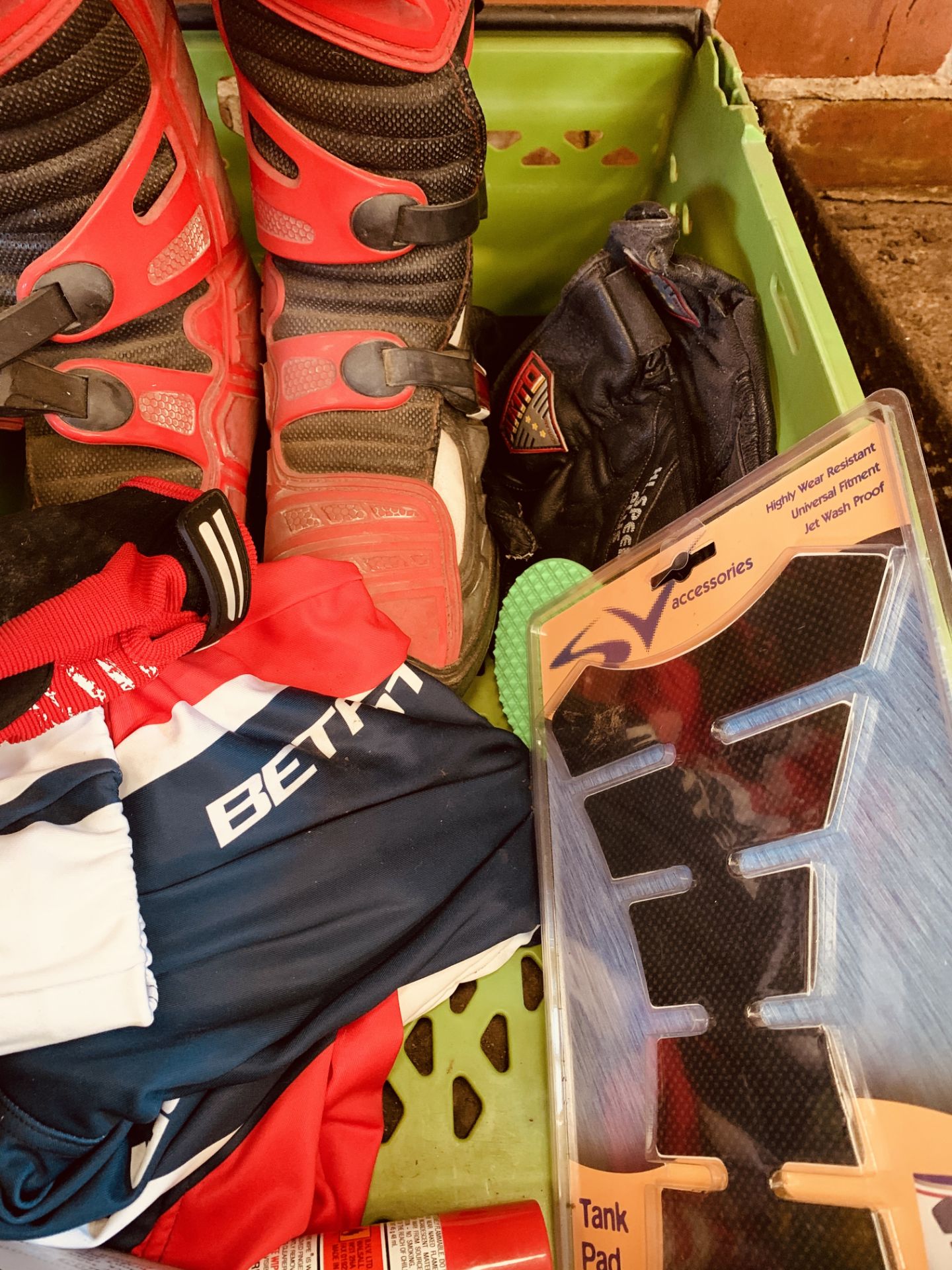 Box containing: a pair of motorcycle boots; Disclock and sprocket and other items. - Image 2 of 2