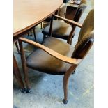 Danish 'Vanson' 1950's teak extendable table together with 3 chairs and 2 carvers.