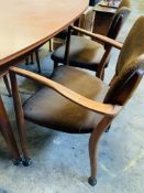 Danish 'Vanson' 1950's teak extendable table together with 3 chairs and 2 carvers.