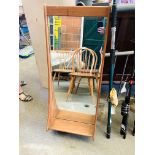 Danish bevelled glass wall mirror with shelf beneath.