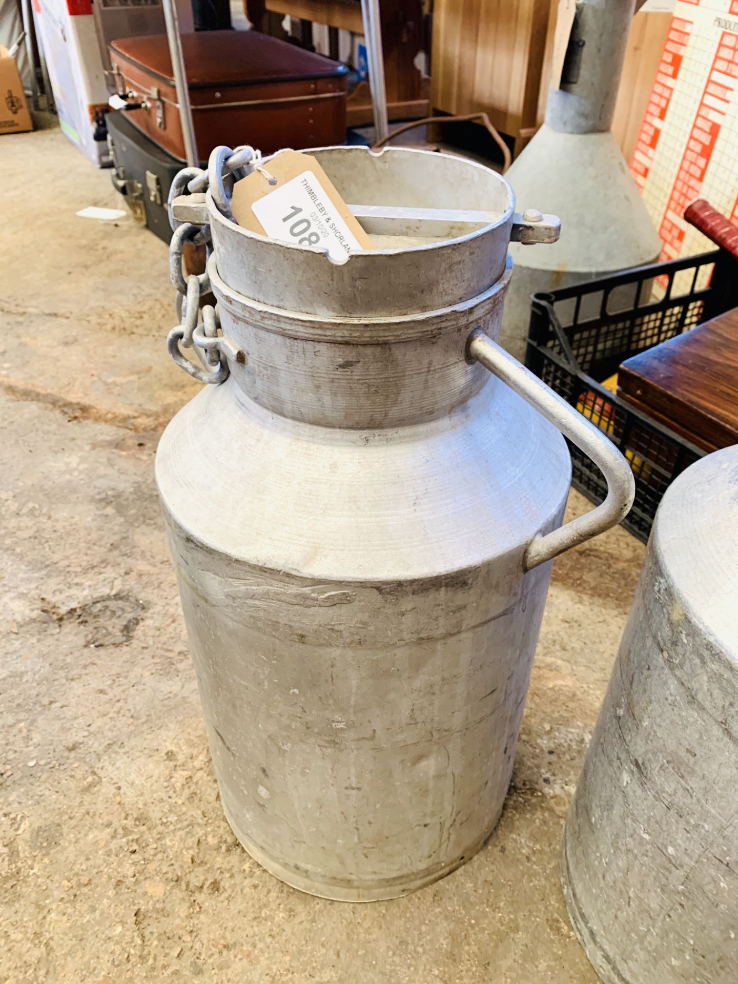 Aluminium milk churn.