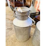 Aluminium milk churn.