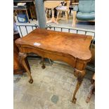 Walnut veneer and mahogany card table.