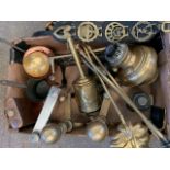 Brass fire dogs, brass fire irons, 2 brass trivets, brass clockwork spit, large silver plate flask