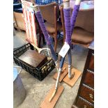 3 Hockey sticks mounted on wooden bases.