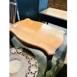 Mahogany shape top side table and a circular side table.