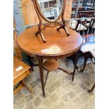 Mahogany display table with inlaid top.