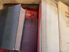 Collection of hymn books, Order of Service of Queen Elizabeth's Coronation, and various sheet music.