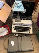 Brother 7300 typewriter; Phillips DVD player; quantity of CD's and DVD's; a Tiffany style lamp