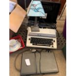 Brother 7300 typewriter; Phillips DVD player; quantity of CD's and DVD's; a Tiffany style lamp