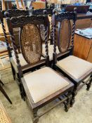 4 cane backed oak dining chairs with drop in seats.