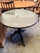 Oak tilt top table.