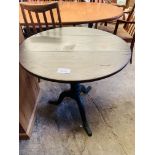 Oak tilt top table.