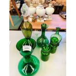 Quantity decorative green glass ware including two decanters.