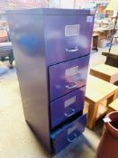 Four drawer purple coloured metal filing cabinet.