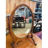 Mahogany framed bevelled edge toilet mirror.