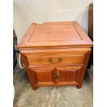 Hardwood bedside table, with frieze drawer over cupboard.