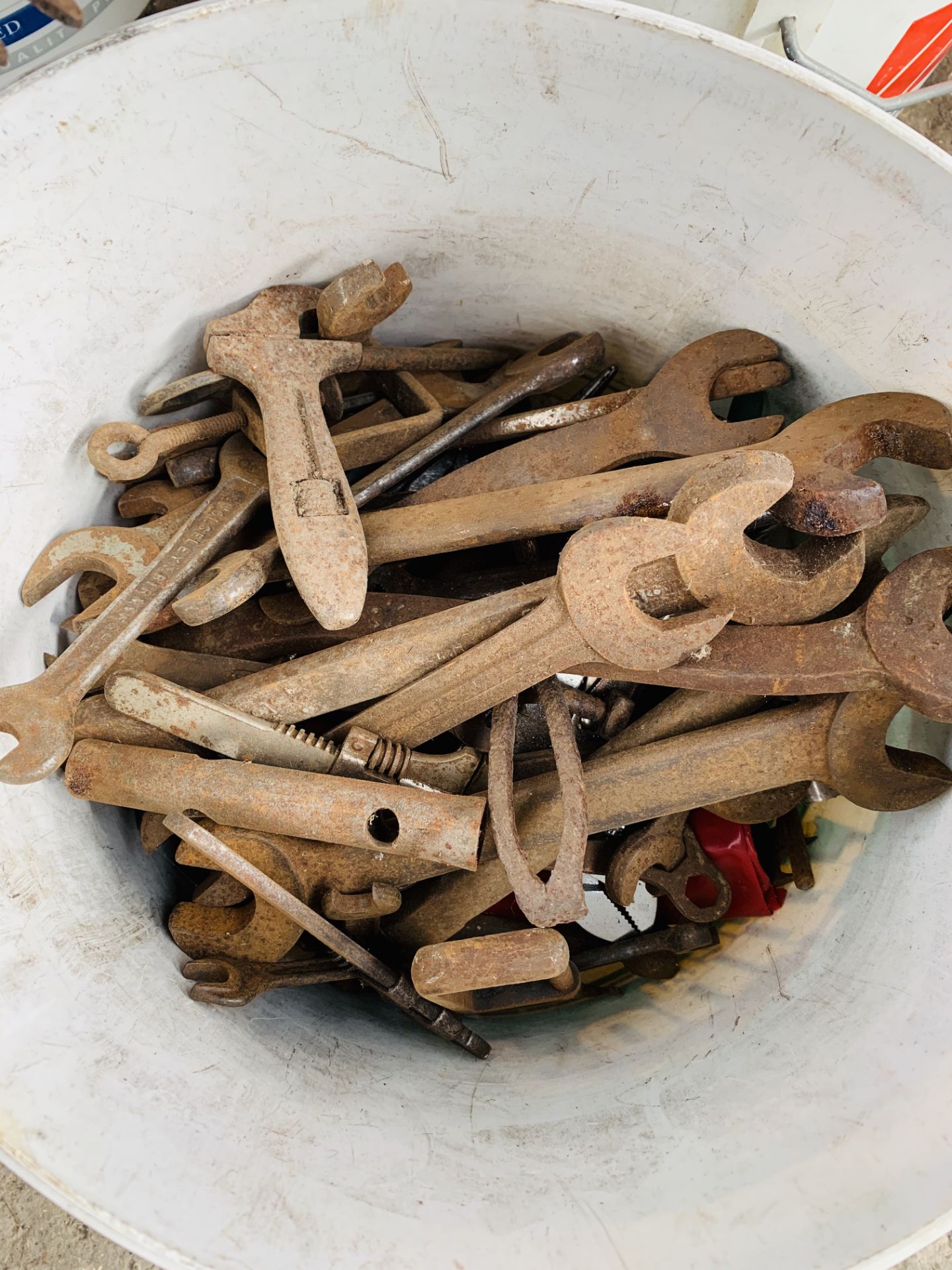 4 buckets containing various tools, spanners, scrapers