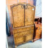 Walnut veneer cocktail cabinet.