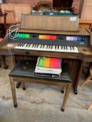 Kimble electric organ, stool, instructions & sheet music.