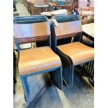 15 stackable metal and wood chairs.